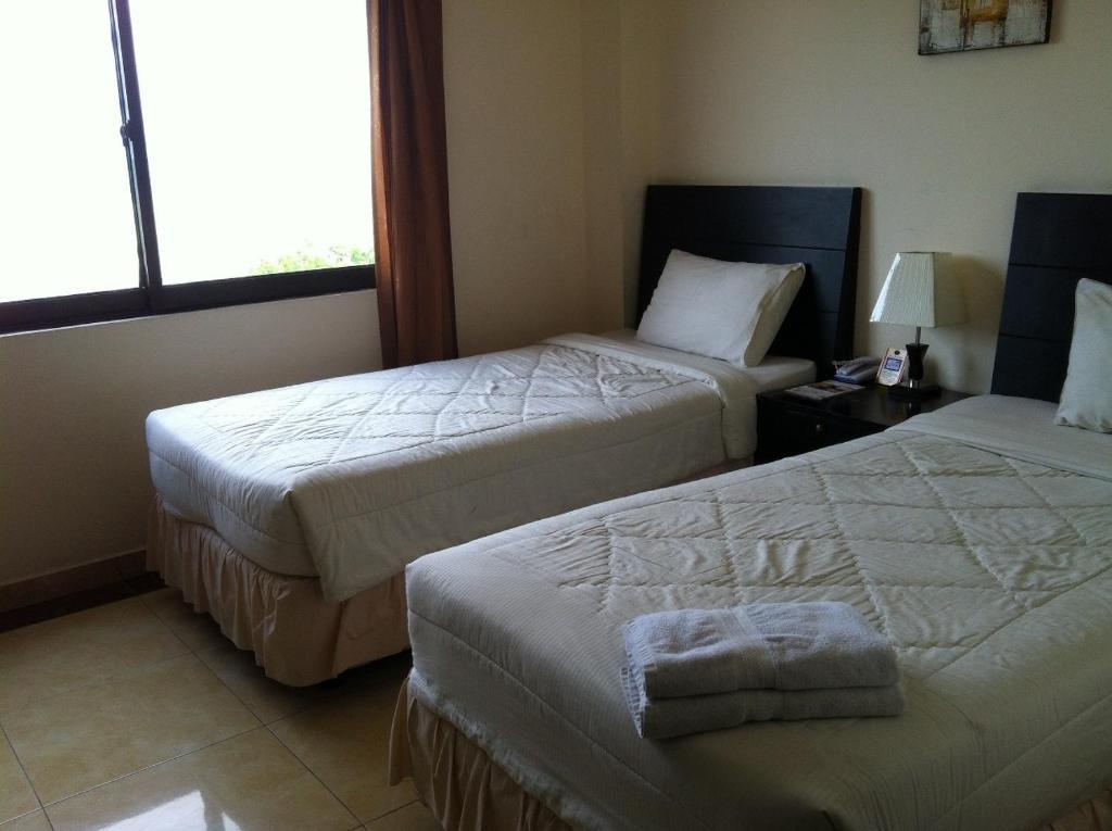 Grand Duta Hotel Παλού Δωμάτιο φωτογραφία
